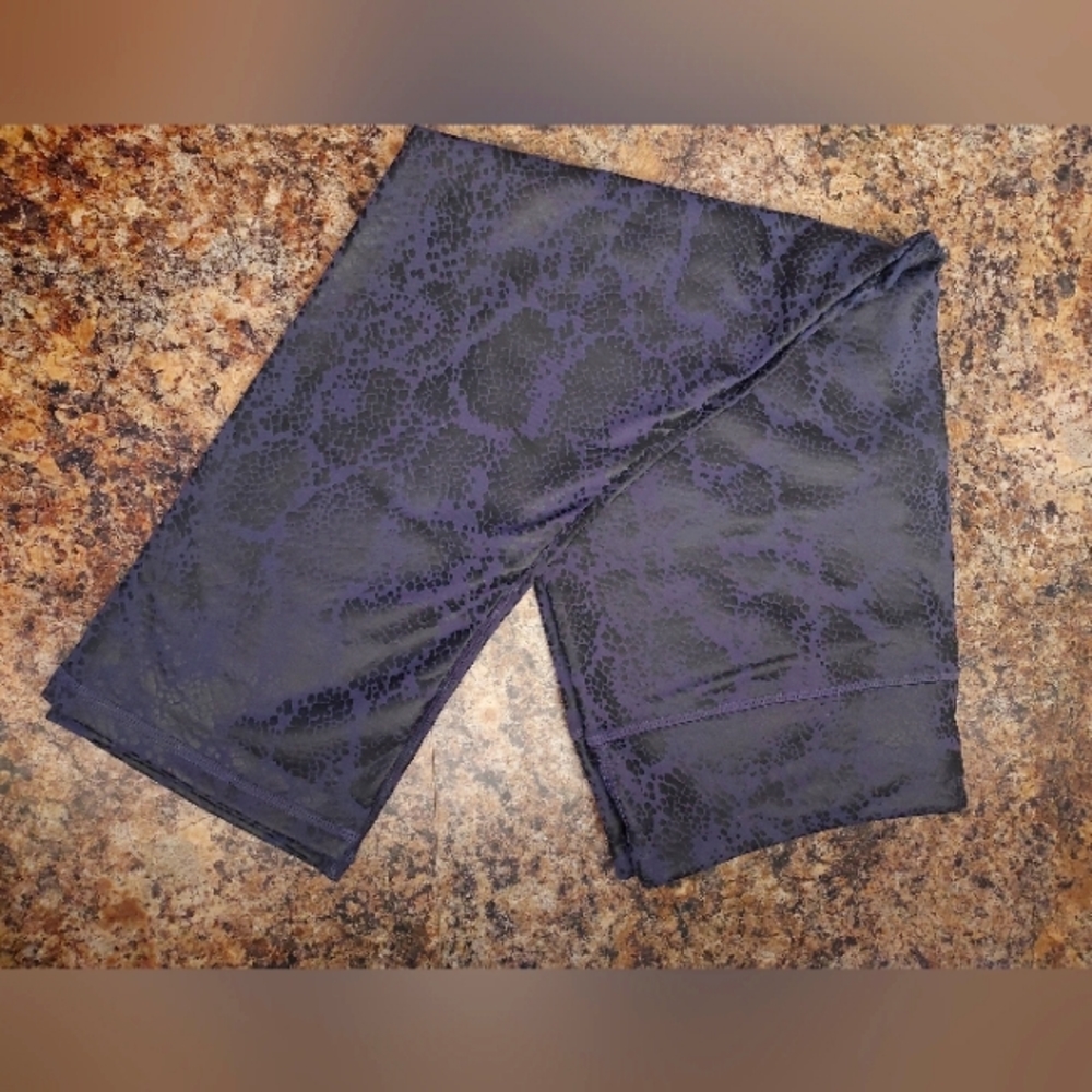 Fabletics high-wasted Capri leggings purple snake skin
